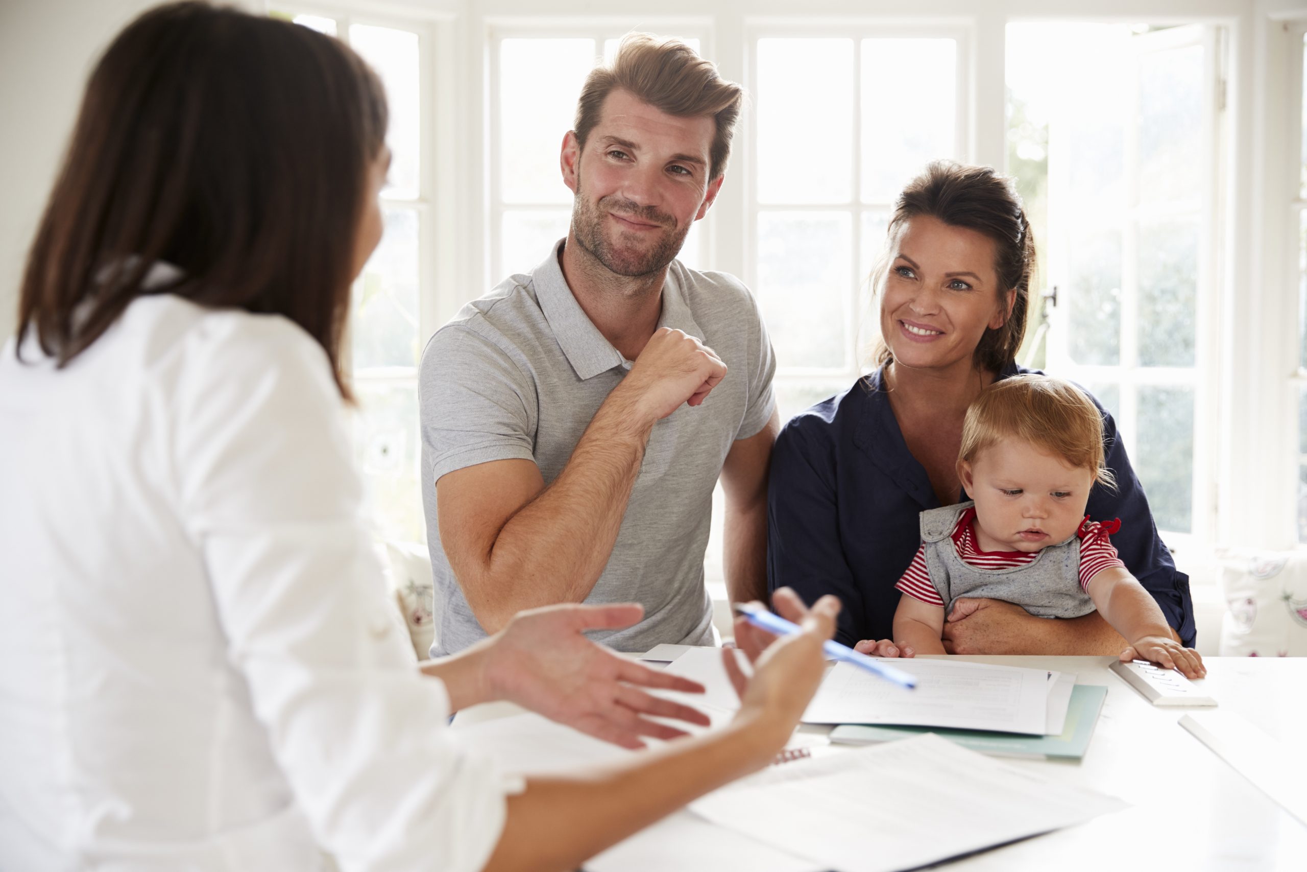 family-with-baby-meeting-financial-advisor-at-home-budget-and-the-bees