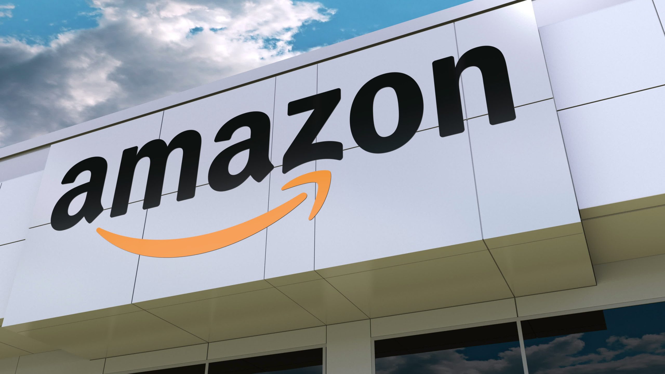 Amazon.com logo on the modern building facade. Editorial 3D