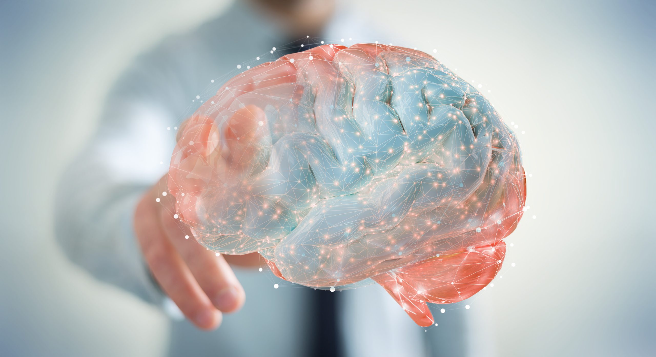 Businessman on blurred background using using digital 3D projection of a human brain 3D rendering