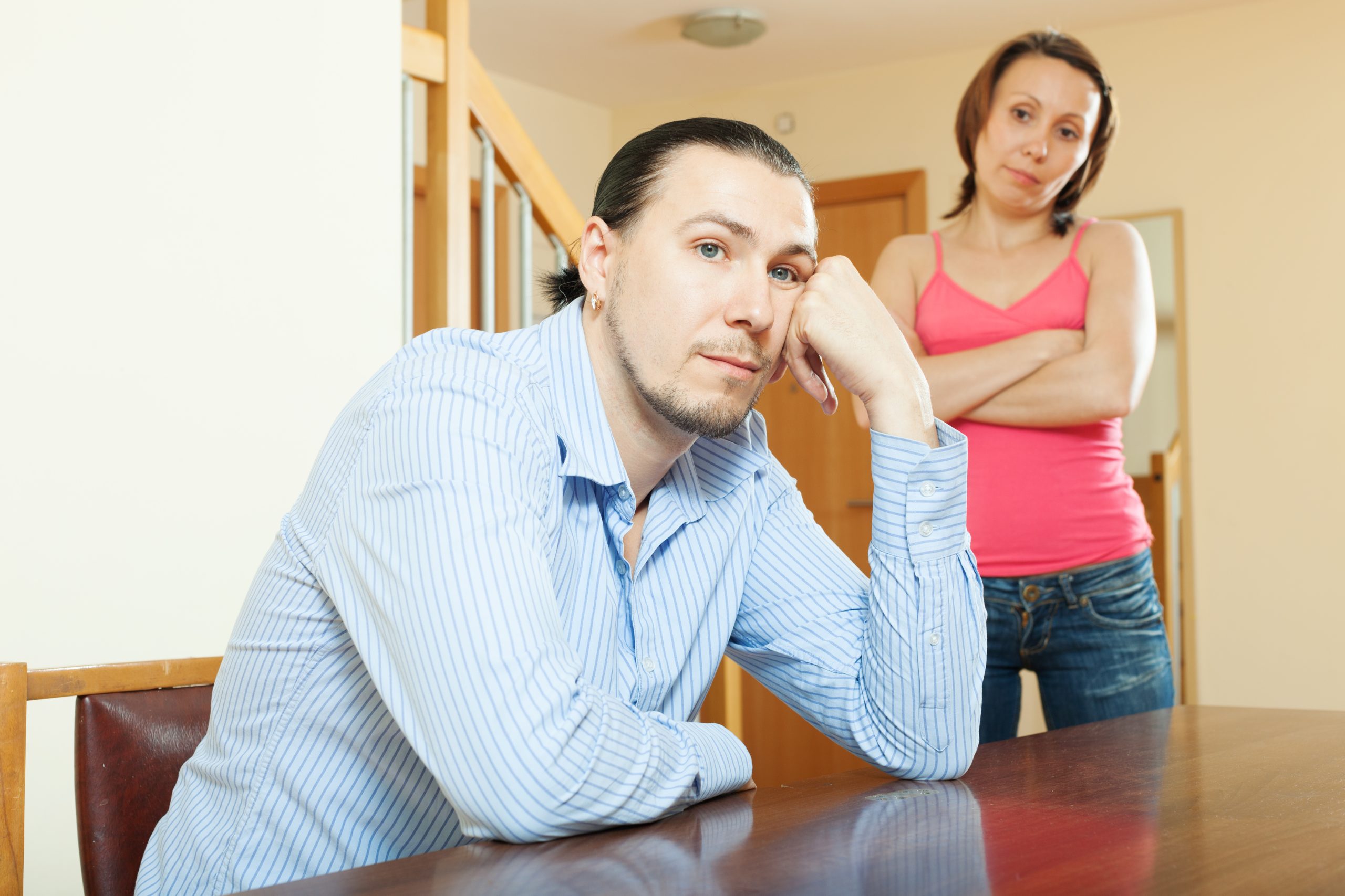 middle-aged couple having quarrel at home