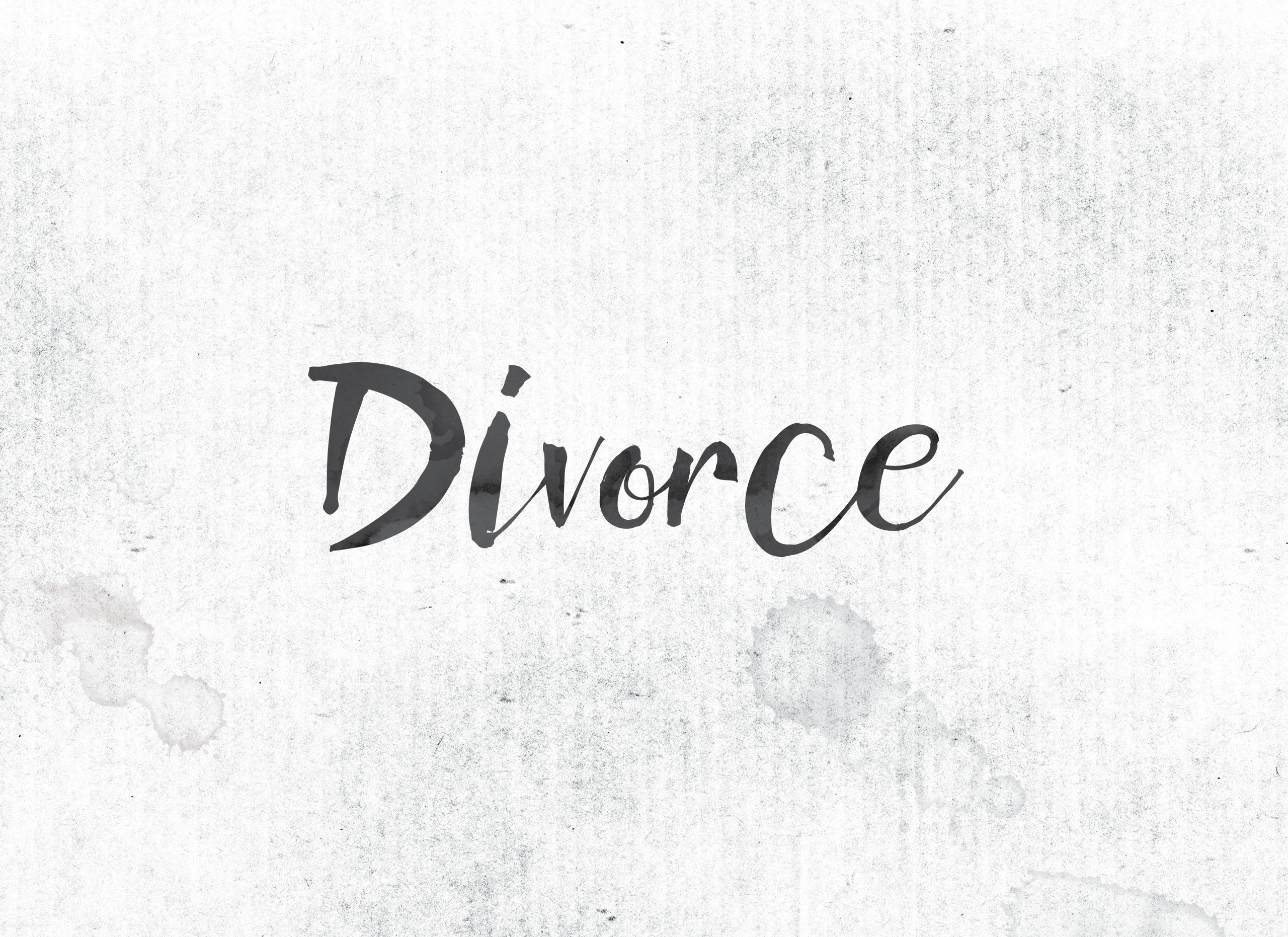 The word Divorce concept and theme painted in black ink on a watercolor wash background.